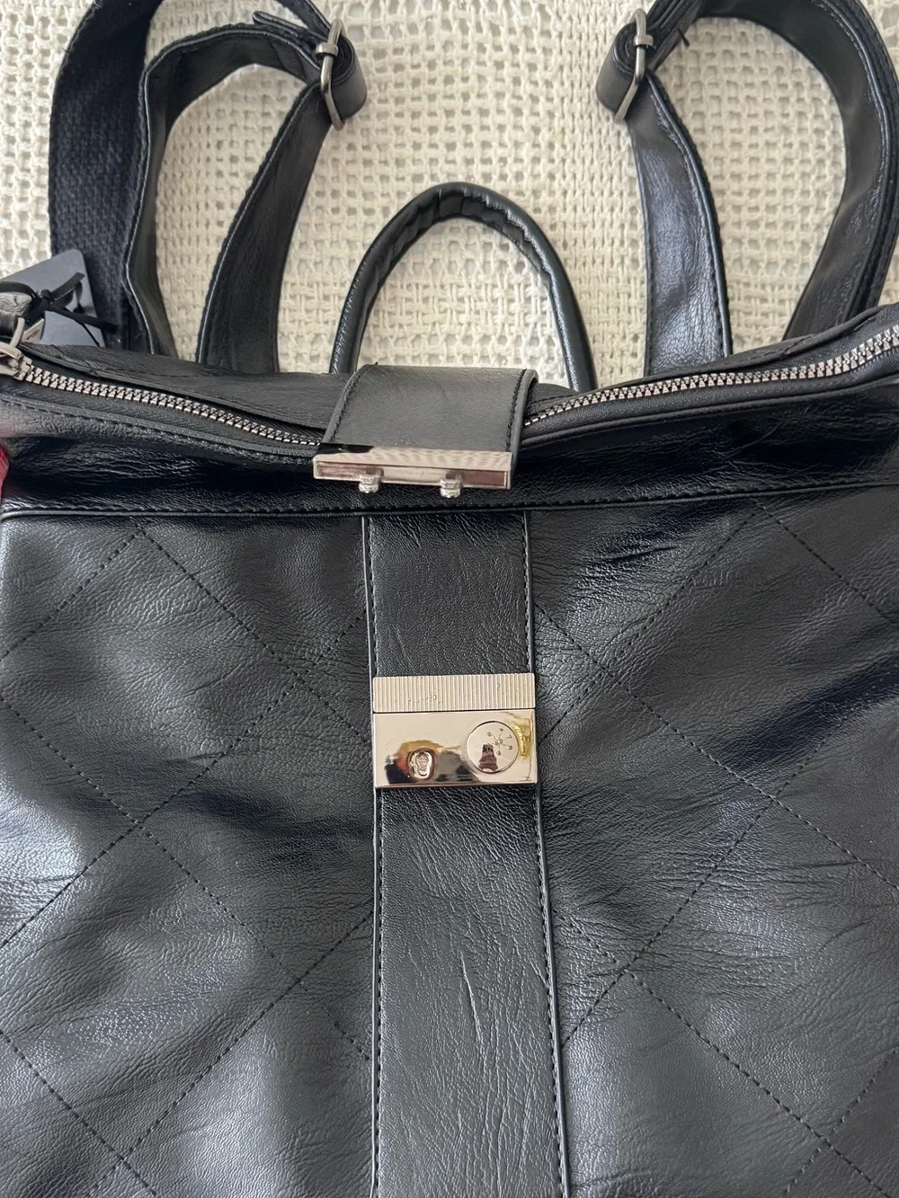 Quilted Black Leather-Effect Backpack with Front Clasp